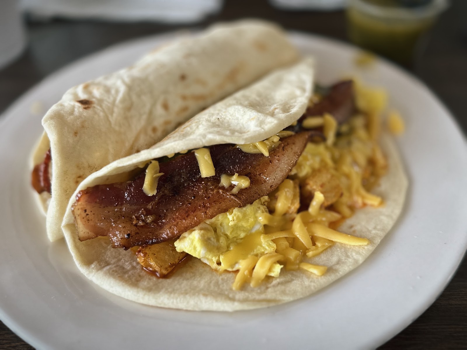 Made-to-order chorizo, potato, egg, bacon and cheese breakfast taco at El Valle De Mexico